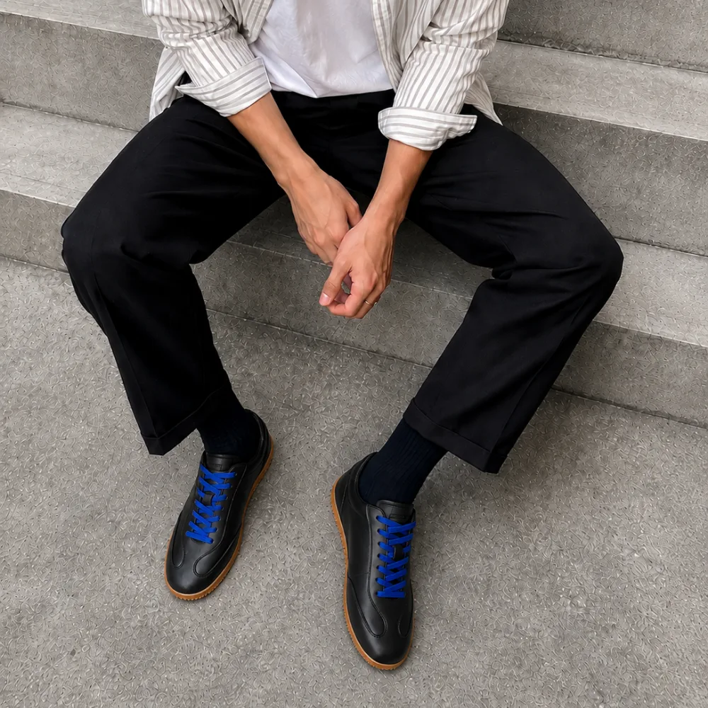 Camden Leather Sneaker on the steps
