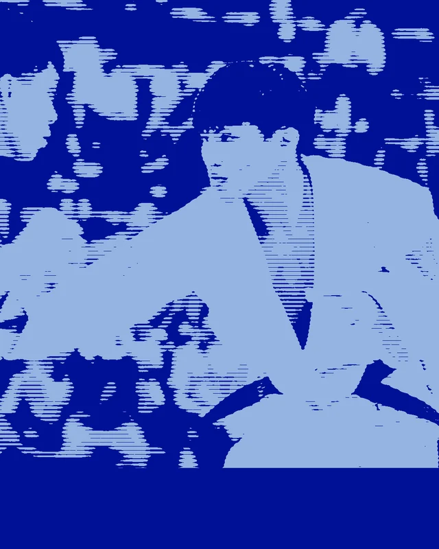 An Ateneo judoka mid-throw during a UAAP bout